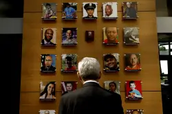 An exhibit honoring victims of gun violence is taken down at ATF headquarters